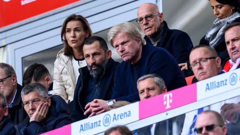 Hasan Salihamidzic, centre left, and Oliver Kahn, center right, have both been fired by FC Bayern Munich. (Tom Weller/dpa via AP) 