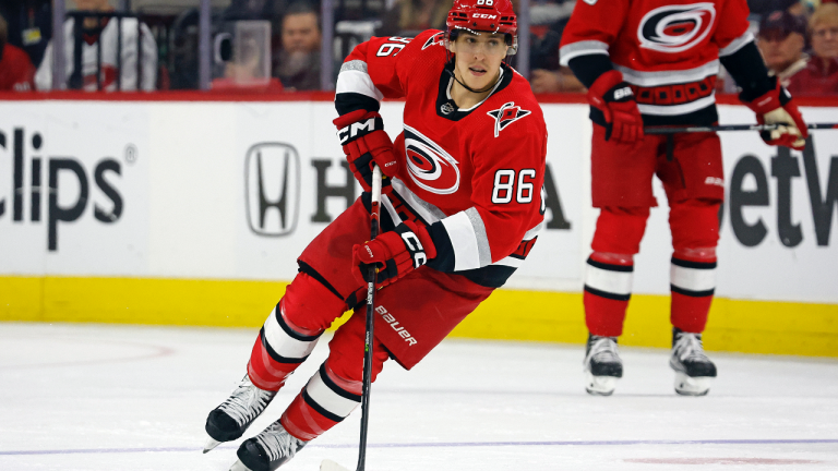 FILE - Carolina Hurricanes' Teuvo Teravainen skates with the puck during the second period of Game 2 in the team's NHL hockey Stanley Cup first-round playoff series against the New York Islanders in Raleigh, N.C., April 19, 2023. Teravainen's roughly month-long absence due to injury could be nearing an end. The Carolina Hurricanes forward has shed his no-contact jersey and participated in a full practice Monday, May 15, ahead of the Eastern Conference final against Florida. Teravainen hasn't played since he suffered a thumb injury early in the first-round series. (AP Photo/Karl B DeBlaker, File)