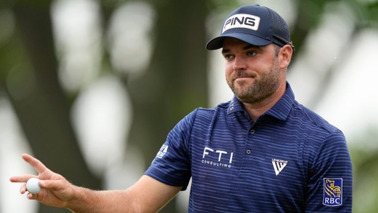 Corey Conners, of Canada, waves after his putt on the fourth hole during the second round of the PGA Championship golf tournament at Oak Hill Country Club on Friday, May 19, 2023, in Pittsford, N.Y. (Eric Gay/AP) 