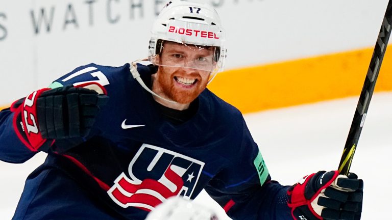 United States T J Tynan celebrates after Cutter Gauthier scored the opening goal during the group A match between United States and Denmark at the ice hockey world championship in Tampere, Finland, Saturday, May 20, 2023. (Pavel Golovkin/AP) 