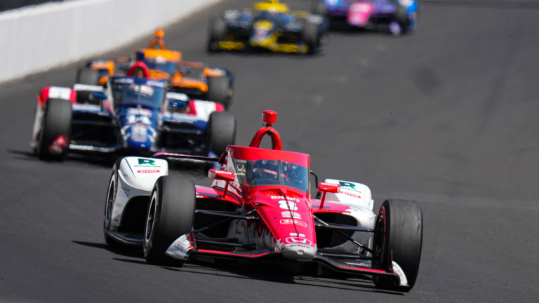 Marcus Ericsson, of Sweden, leads a pack as they head into the first turn during the final practice for the Indianapolis 500 auto race at Indianapolis Motor Speedway in Indianapolis, Friday, May 26, 2023. (AP Photo/Michael Conroy)