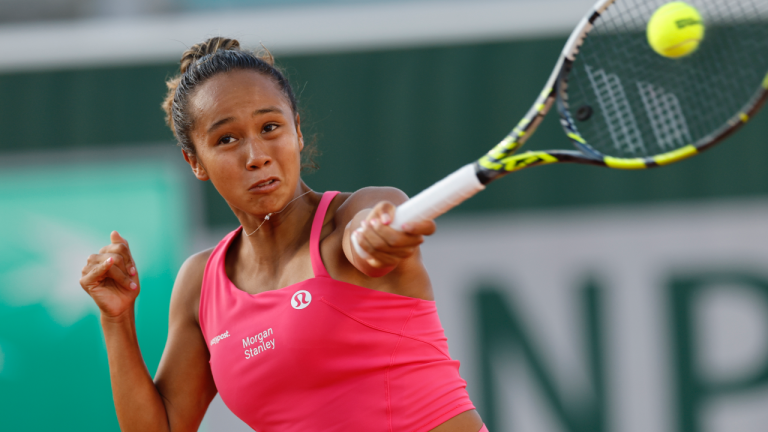 Canada's Leylah Fernandez plays a shot against Denmark's Clara Tauson during their second round match of the French Open tennis tournament at the Roland Garros stadium in Paris, Wednesday, May 31, 2023. (Jean-Francois Badias/AP)