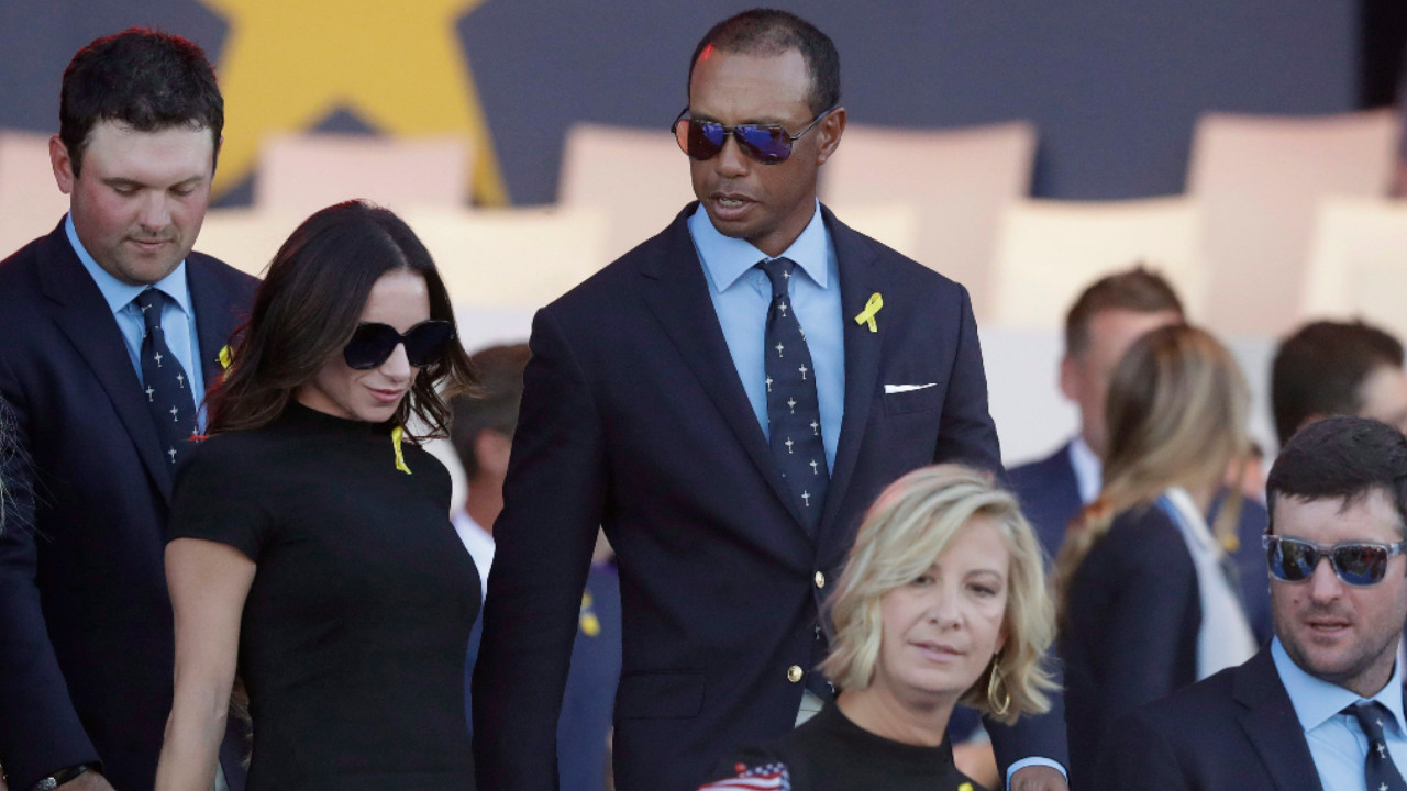 Tiger Woods and Erica Herman leave at the the end of the opening ceremony of the Ryder Cup at Le Golf National in Saint-Quentin-en-Yvelines, outside Paris, France, Thursday, Sept. 27, 2018. (Matt Dunham/AP) 