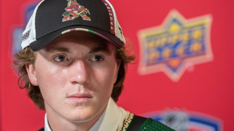 Logan Cooley of the United States speaks during a news conference after being selected as the third overall pick by the Arizona Coyotes during the 2022 NHL draft in Montreal, Thursday, July 7, 2022. (Graham Hughes/CP)