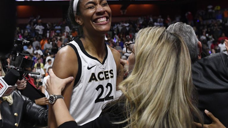 Las Vegas Aces head coach Becky Hammon, right, celebrates with Las Vegas Aces' A'ja Wilson after their win in the WNBA basketball finals against the Connecticut Sun, Sunday, Sept. 18, 2022, in Uncasville, Conn. (AP)