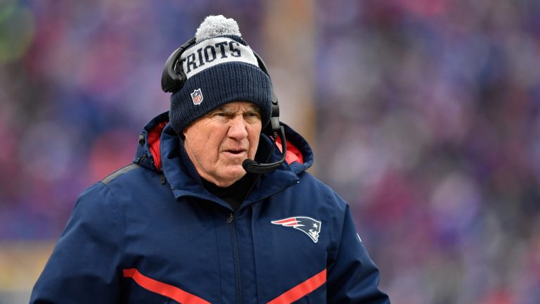 New England Patriots head coach Bill Belichick works the sideline during the first half of an NFL football game against the Buffalo Bills, Sunday, Jan. 8, 2023, in Orchard Park. (Adrian Kraus/AP)