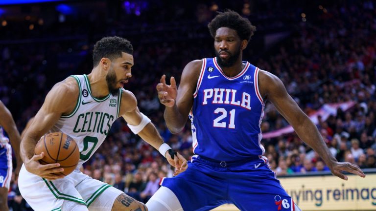 Boston Celtics' Jayson Tatum makes his move to the basket against Philadelphia 76ers' Joel Embiid during the first half of an NBA basketball game Tuesday, April 4, 2023, in Philadelphia. (Chris Szagola/AP Photo)