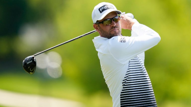 Corey Conners, of Canada, watches his tee shot on the 18th hole during the first round of the PGA Championship golf tournament at Oak Hill Country Club on Thursday, May 18, 2023, in Pittsford, N.Y. (Seth Wenig/AP)