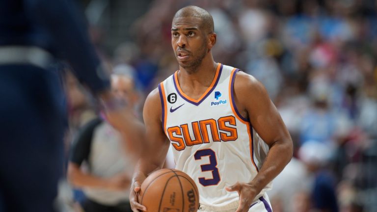 Phoenix Suns guard Chris Paul looks to pass the ball in the second half of Game 2 of an NBA second-round playoff series against the Denver Nuggets Monday, May 1, 2023, in Denver. (David Zalubowski/AP Photo)