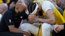 Lakers&#8217; Anthony Davis suffers head injury vs. Warriors, forced to leave game