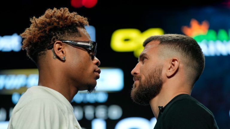 Devin Haney, left, and Vasiliy Lomachenko pose during a press conference Wednesday, May 17, 2023, in Las Vegas. The two are scheduled to face each other in a lightweight championship boxing match Saturday in Las Vegas. (John Locher/AP)