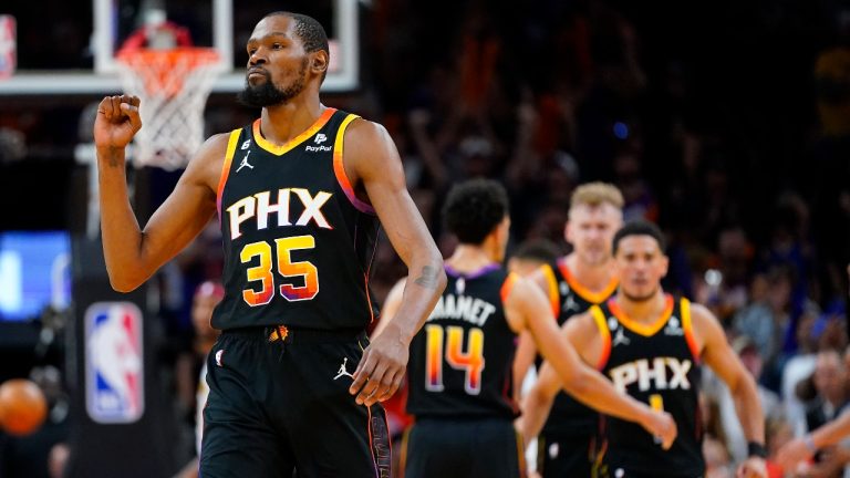 Phoenix Suns forward Kevin Durant (35) celebrates during the second half of Game 3 of an NBA basketball Western Conference semifinal game against the Denver Nuggets. (Matt York/AP)