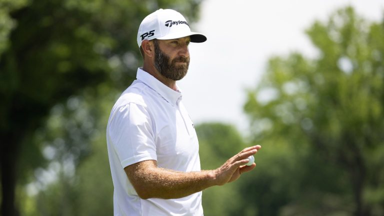 Captain Dustin Johnson of 4Aces GC reacts to his putt on the eighth green during the second round of LIV Golf Tulsa at the Cedar Ridge Country Club on Saturday, May. 13, 2023 in Broken Arrow, Oklahoma. (LIV Golf via AP)