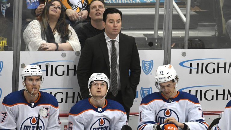 Edmonton Oilers head coach Jay Woodcroft watches as his team plays the Pittsburgh Penguins during the third period of an NHL hockey game, Thursday, Feb. 23, 2023, in Pittsburgh. The Oilers traded a fifth-round pick in this year's draft to the New York Rangers for the rights to sign prospect Jayden Grubbe. THE CANADIAN PRESS/AP-Philip G. Pavely