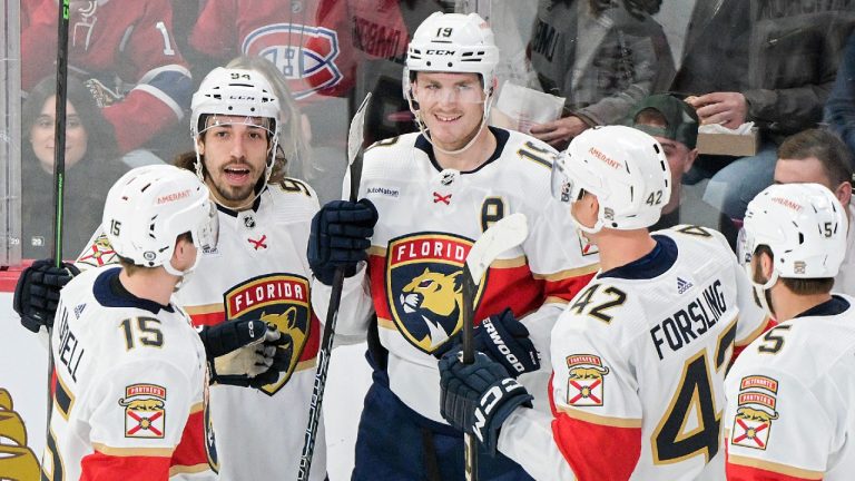 Florida Panthers' Matthew Tkachuk (19) celebrates with teammates after scoring against the Montreal Canadiens during second period NHL hockey action in Montreal, Thursday, March 30, 2023. (Graham Hughes/CP)