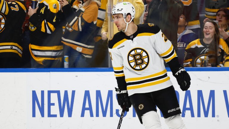 Boston Bruins right wing Garnet Hathaway celebrates his goal during the first period of an NHL hockey game against the Buffalo Sabres, Sunday, March 19, 2023, in Buffalo, N.Y. (Jeffrey T. Barnes/AP)