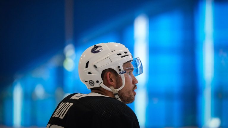 Vancouver Canucks defenceman Jett Woo skates during the NHL hockey team's training camp in Whistler, B.C., on Thursday, Sept. 22, 2022. The Canucks signed Woo to a one-year, two-way contract on Wednesday. THE CANADIAN PRESS/Darryl Dyck