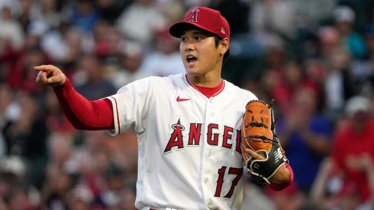 Los Angeles Angels starting pitcher Shohei Ohtani gestures to a teammate after Miami Marlins' Xavier Edwards grounded into a double play to end the top of the second inning of a baseball game Saturday, May 27, 2023, in Anaheim, Calif. (Mark J. Terrill/AP)