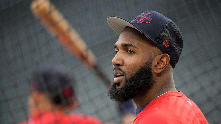 Atlanta Braves' Marcell Ozuna warms up for the team's baseball game against the Colorado Rockies on Friday, June 3, 2022, in Denver. (David Zalubowski/AP)