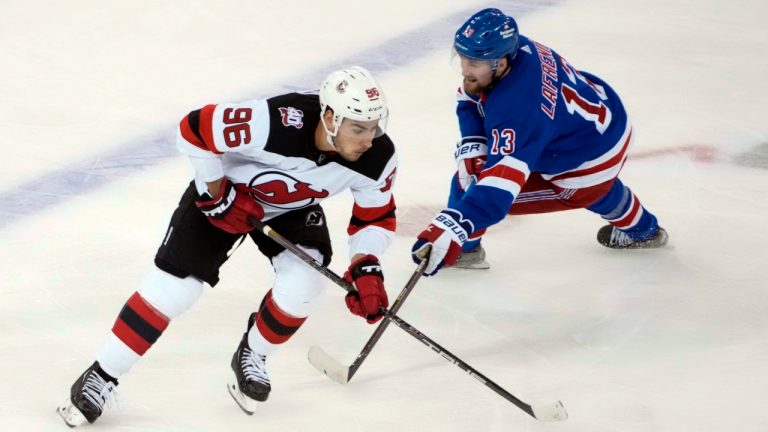 New Jersey Devils right wing Timo Meier (96) skates against New York Rangers left wing Alexis Lafrenière (13) during the second period of an NHL hockey game, Saturday, April 29, 2023, at Madison Square Garden in New York. (Mary Altaffer/AP)