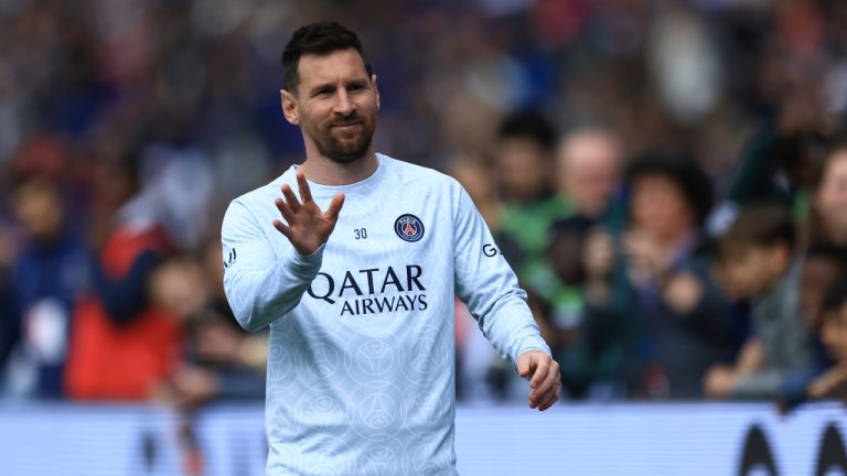 Lionel Messi gestures as he warms up before the French League One soccer match between Paris Saint-Germain and Lorient, at the Parc des Princes stadium in Paris, Sunday, April 30, 2023. (Aurelien Morissard/AP)