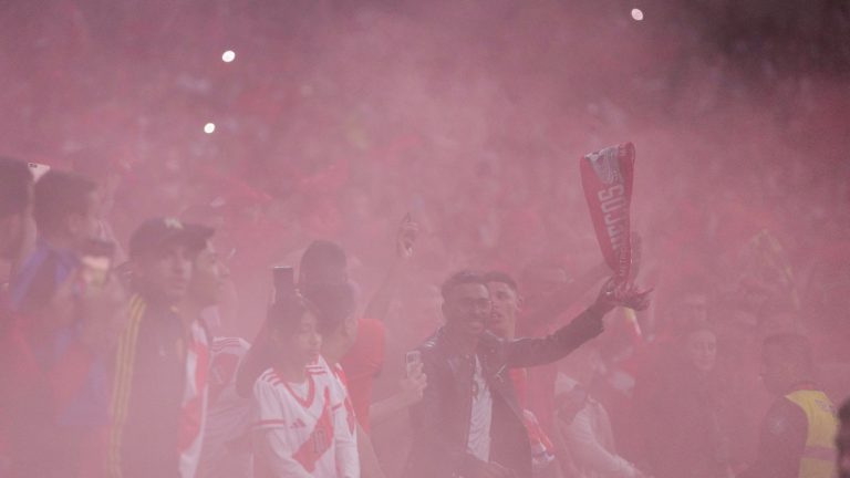 Fans set off a smoke bomb during the International friendly soccer match between Morocco and Peru at the Civitas Metropolitano stadium in Madrid, Spain, Tuesday, March 28, 2023. (Manu Fernandez/AP)