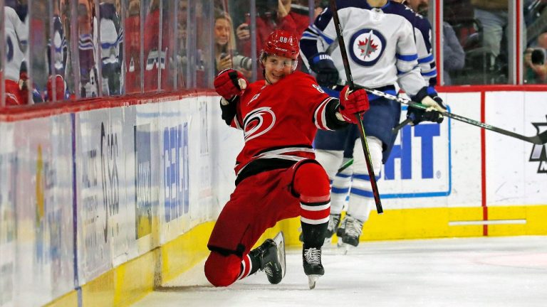 Carolina Hurricanes' Martin Necas (88), of the Czech Republic, celebrates his goal against the Winnipeg Jets during the first period of an NHL hockey game. (Karl B DeBlaker/AP)