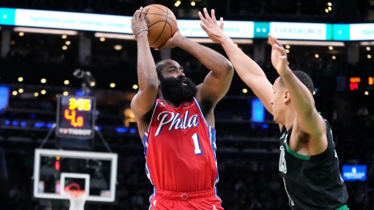 Philadelphia 76ers guard James Harden (1) shoots against Boston Celtics guard Malcolm Brogdon, right, during the first half of Game 1 in the NBA basketball Eastern Conference semifinals playoff series, Monday, May 1, 2023, in Boston. (Charles Krupa/AP)