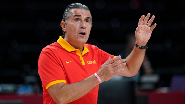 Spain head coach Sergio Scariolo signals against Japan during a men's basketball preliminary round game at the 2020 Summer Olympics in Saitama, Japan, Monday, July 26, 2021. (Eric Gay/AP)