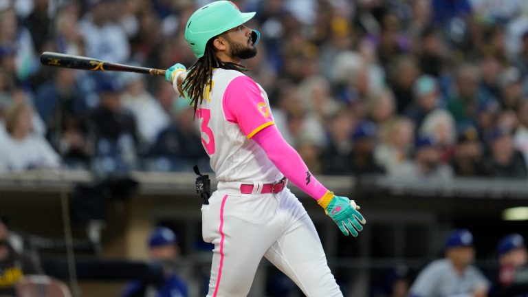 San Diego Padres' Fernando Tatis Jr. watches his home run hit during the third inning of a baseball game against the Los Angeles Dodgers, Friday, May 5, 2023, in San Diego. (Gregory Bull/AP)