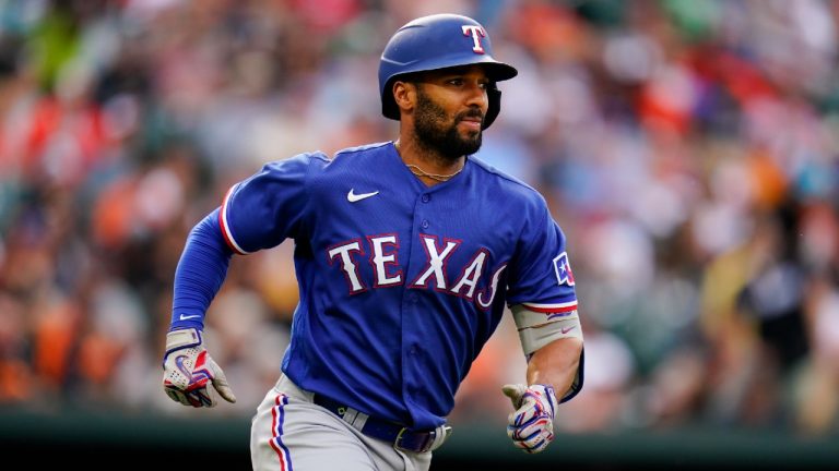 Texas Rangers' Marcus Semien watches his single against the Baltimore Orioles during the ninth inning of a baseball game, Saturday, May 27, 2023, in Baltimore. The Rangers won 5-3. (Julio Cortez/AP)