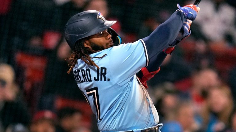 Toronto Blue Jays' Vladimir Guerrero Jr. watches his two-RBI single during the fifth inning of a baseball game against the Boston Red Sox at Fenway Park, Tuesday, May 2, 2023, in Boston. (Charles Krupa/AP)