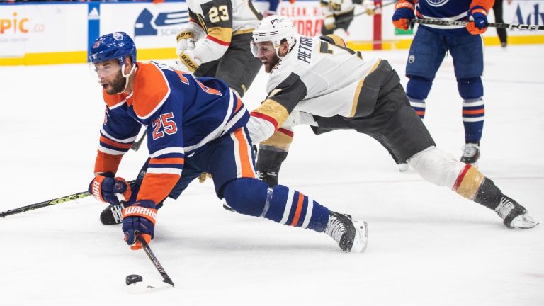 Vegas Golden Knights' Alex Pietrangelo (7) trips up Edmonton Oilers' Darnell Nurse (25) during second period NHL Stanley Cup second round playoff action in Edmonton on Wednesday May 10, 2023. (Jason Franson/CP)