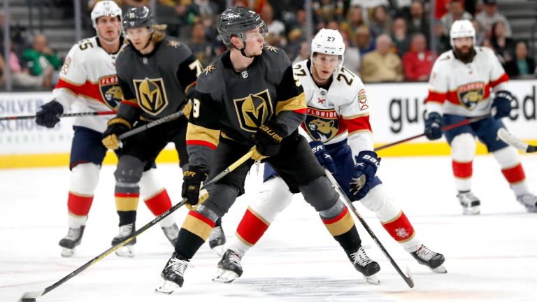 Vegas Golden Knights center Jack Eichel (9) prepares to pass in front of Florida Panthers center Eetu Luostarinen (27) during the first period of an NHL hockey game Thursday, March 17, 2022, in Las Vegas. (Steve Marcus/AP)