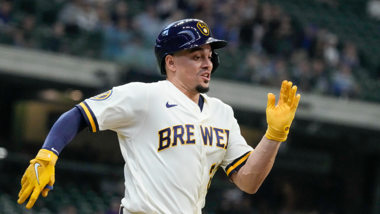 Brewers SS Willy Adames leaves game after getting hit by foul ball while in  dugout