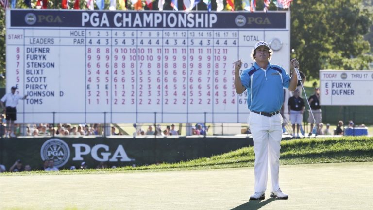 Jason Dufner celebrates after winning the PGA Championship golf tournament at Oak Hill Country Club, Sunday, Aug. 11, 2013, in Pittsford, N.Y. The PGA Championship returns to Oak Hill for the fourth time on May 18-21, 2023. (AP Photo/Julio Cortez, File)