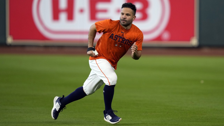 Houston Astros' Jose Altuve runs in the outfield before a baseball game against the Texas Rangers Sunday, April 16, 2023, in Houston. (AP Photo/David J. Phillip)