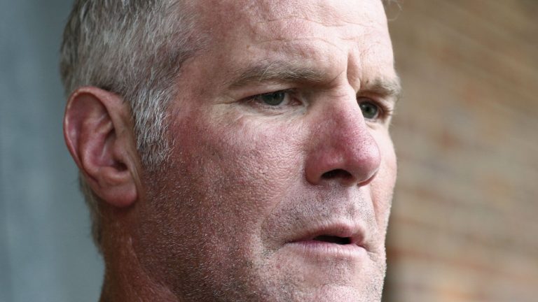 FILE - Former NFL quarterback Brett Favre speaks to the media in Jackson, Miss., Oct. 17, 2018. (Rogelio V. Solis/AP)