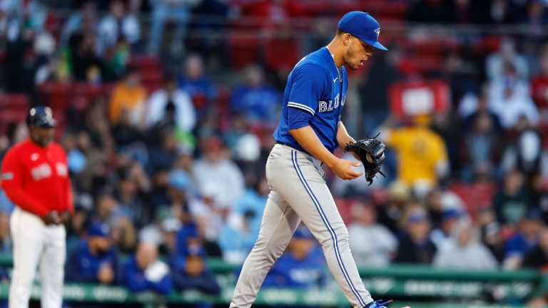 Toronto Blue Jays' Jose Berrios walks on the mound after giving up an RBI-double to Boston Red Sox's Masataka Yoshida during the first inning of a baseball game, Monday, May 1, 2023, in Boston. (Michael Dwyer/AP)