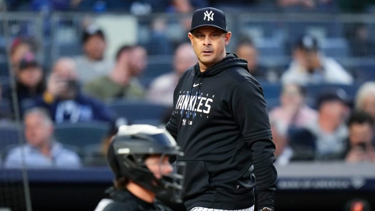 New York Yankees manager Aaron Boone leaves the field after being ejected during the third inning of the team's baseball game against the Baltimore Orioles on Thursday, May 25, 2023, in New York. (Frank Franklin II/AP)