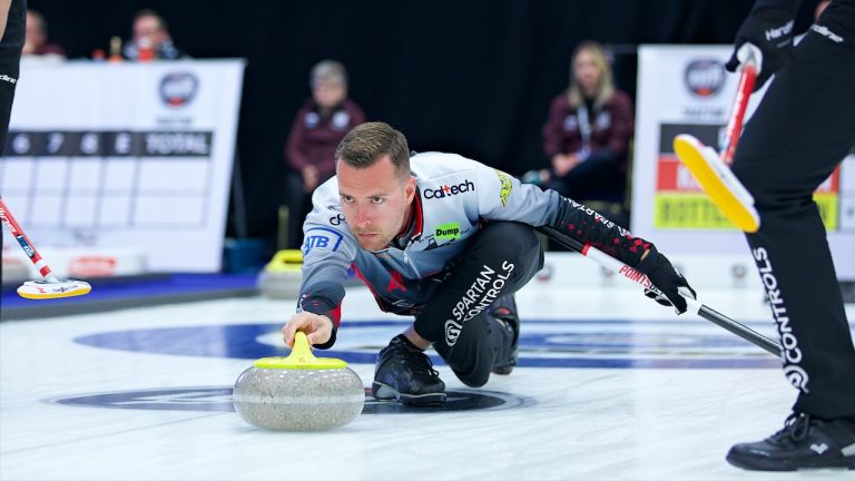 Brendan Bottcher shoots a stone during the opening draw of the KIOTI Tractor Champions Cup on Tuesday, May 2, 2023, in Regina. (Anil Mungal/GSOC)