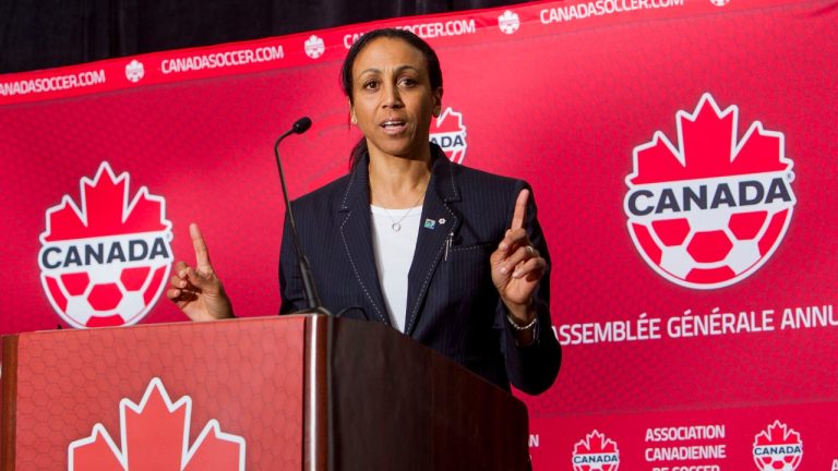 Charmaine Crooks addresses the Canadian Soccer Association 2014 annual general meeting in Vancouver in a handout photo. Newly-elected president Crooks is the latest Canada Soccer official to appear before the Standing Committee on Canadian Heritage with the governing body's ongoing labour dispute and past practices up for scrutiny by MPs. (Bob Frid/HO-Canada Soccer/CP)