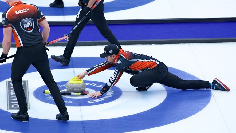 Matt Dunstone slides with a rock during the seventh round-robin draw of the KIOTI Tractor Champions Cup on Wednesday, May 3, 2023, in Regina. (Anil Mungal/GSOC)