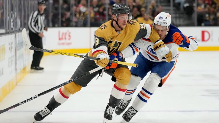 Vegas Golden Knights center Jack Eichel (9) vies for the puck with Edmonton Oilers defenseman Philip Broberg (86) during the second period of Game 5 of an NHL hockey Stanley Cup second-round playoff series Friday, May 12, 2023, in Las Vegas. (John Locher/AP Photo)