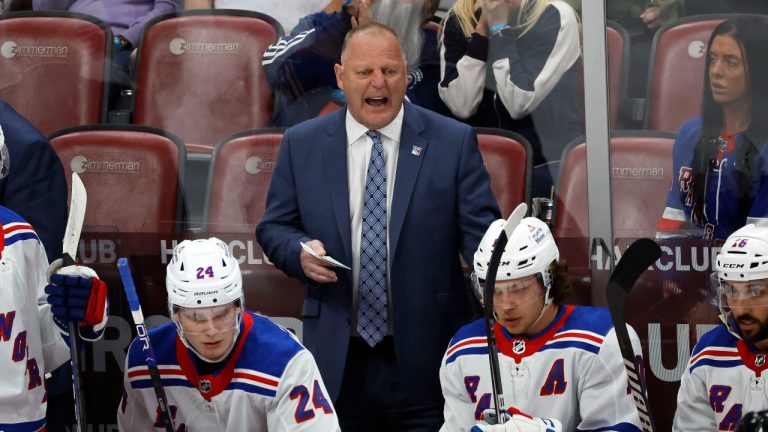 New York Rangers head coach Gerard Gallant, top, reacts during the second period of an NHL hockey game against the Florida Panthers, Saturday, March 25, 2023, in Sunrise, Fla. (Rhona Wise/AP Photo)