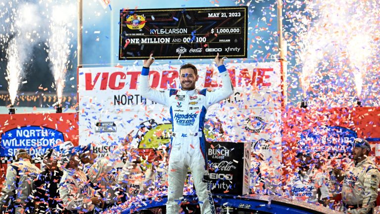 Kyle Larson (5) celebrates in Victory Lane after winning the NASCAR All-Star Cup Series auto race at North Wilkesboro Speedway, Sunday, May 21, 2023, in North Wilkesboro, N.C. (Matt Kelley/AP)