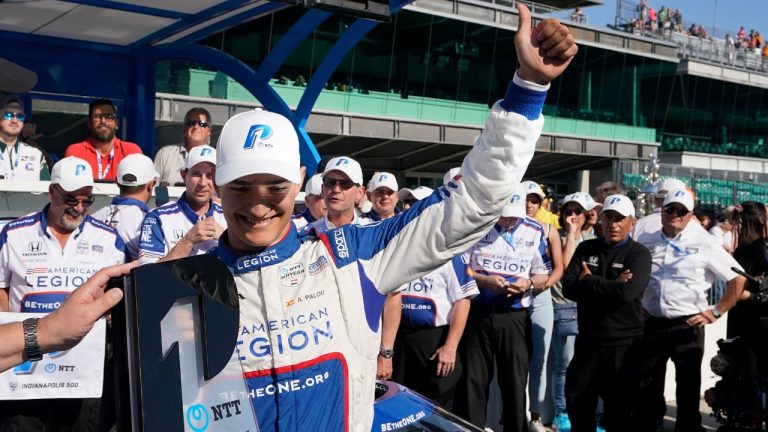 Alex Palou, of Spain, celebrates winning the pole for the Indianapolis 500 auto race at Indianapolis Motor Speedway, Sunday, May 21, 2023, in Indianapolis. (Darron Cummings/AP)