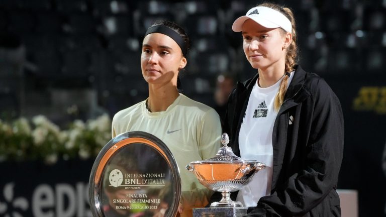 Kazakhstan's Elena Rybakina, right, poses for a picture with Ukraine's Anhelina Kalinina after winning the final match at the Italian Open tennis tournament in Rome, Italy, Sunday, May 21, 2023. (Gregorio Borgia/AP)