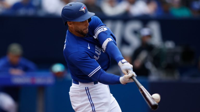 Toronto Blue Jays right fielder George Springer (4) hits a two-run home run in the fifth inning MLB American League baseball action against the Baltimore Orioles in Toronto on Saturday, May 20, 2023. (Cole Burston/CP)