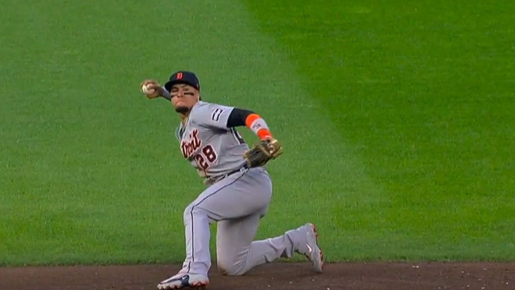 Detroit Tigers shortstop Javier Baez glove flips ball backward